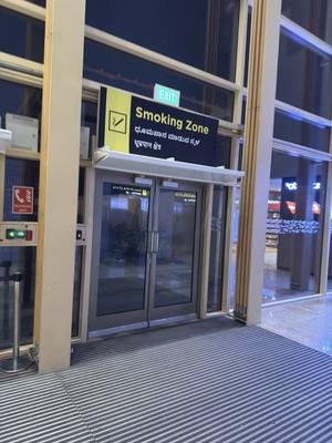 Smoking area at Bangalore (BLR) airport — Beautiful Outdoor Smoking area after security in BLR Airport T2.