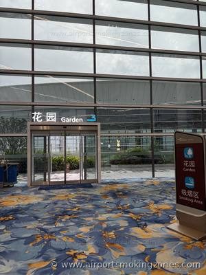 Smoking area at Guangzhou (CAN) airport — Terminal 3, near Gate A838. Outdoor smoking area in the Garden zone (花园). There are benches and…