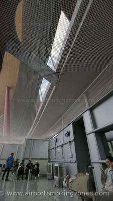 Smoking area at Beijing Capital (PEK) airport — T3E gate 20 smoking area