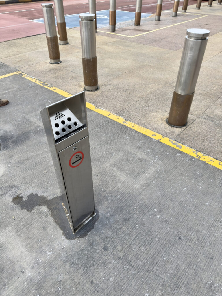 Smoking area outside Terminal 3 at Singapore Changi Airport, next to gate no. 8